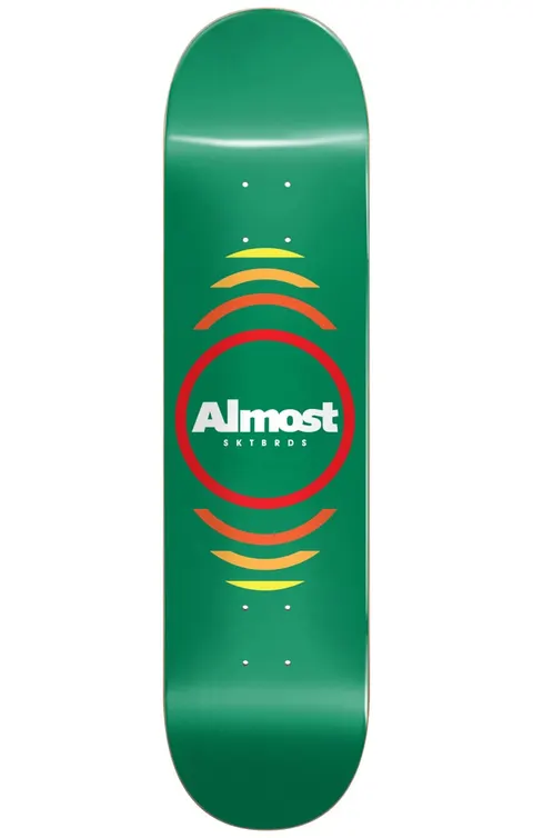 Almost Reflex Youth GREEN 7.375 MID skateboard deck: A red ring around a white Almost SKTBRDS logo, with concentric arcs fading from red through orange to yellow above and below, on a plain green deck.