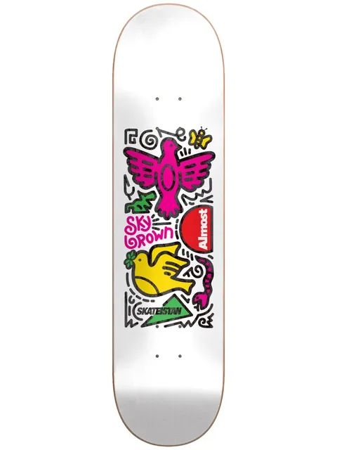 Almost Skateistan Sky Doodle R7 White 8.0 skateboard deck: A cluster of line-drawn doodles in a Keith Haring style: a pink bird, a yellow dove holding a clover, a green leaf, a butterfly, a snake and a red half-sun, on white. The rider's name and Skateistan logo are included.
