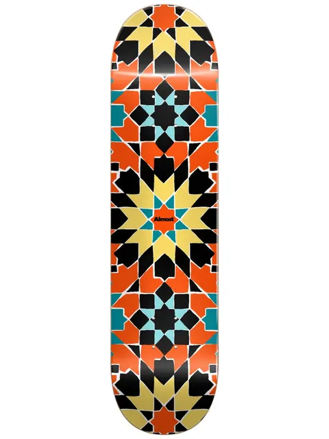 Almost Tile Pattern Logo Orange 7.75 skateboard deck: A symmetrical Moorish tile-style pattern of star shapes in orange, black, yellow and teal covers the whole deck. A tiny Almost logo sits in the centre.