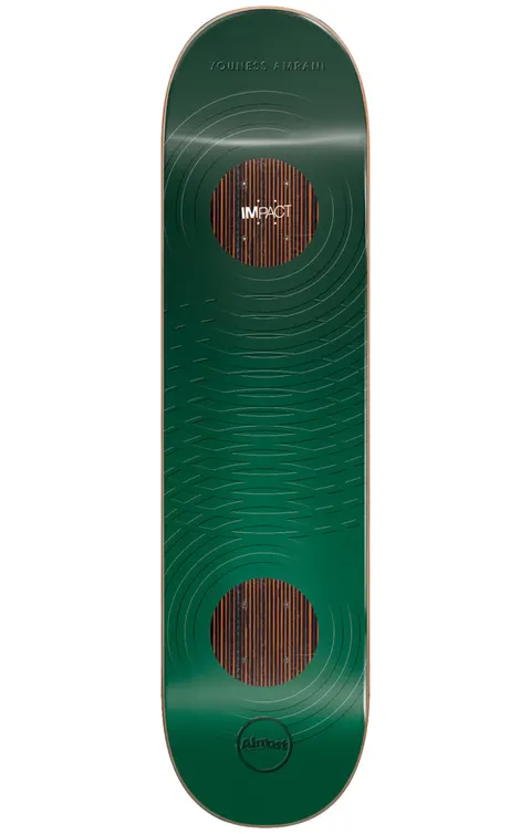 Almost Youness Raised Rings Impact 8.375 skateboard deck: Dark green deck with embossed concentric ring ripples radiating from two circular wood-veneer patches near each end. Impact label on the upper circle and small Almost circle logo at the tail.