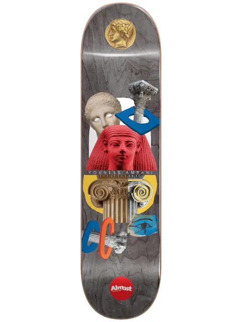 Almost Youness Relics R7 Black 8.5 skateboard deck: Collage of ancient sculpture photos: a gold coin, a marble head, a red Egyptian head, Greek columns and an eye symbol, with blue and yellow shapes on a grey stained deck. Rider name runs across the middle.