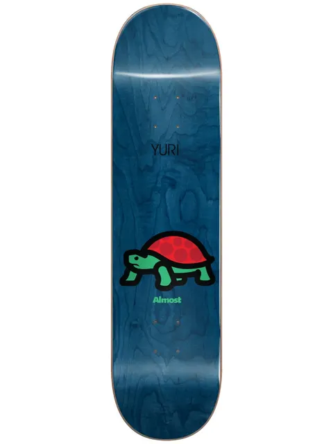 Almost Yuri Mean Pets Impact Light 8.375 skateboard deck: Blue woodgrain-stained deck with a simple cartoon tortoise with a red shell and green body and legs, outlined in black, with the rider name above and Almost logo below.