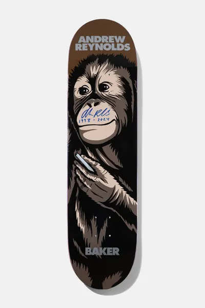 Baker Andrew Reynolds Smoking Monkey 8.25 skateboard deck: A realistic illustration of an orangutan holding a cigarette to its chin, in browns on a black deck, with the rider's name at the top and Baker at the bottom. A blue signature and dates are written over the face.