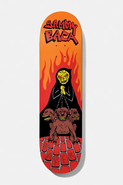 Baker Baca Cerberus 8.5 skateboard deck: Orange deck fading to red flames, with a hooded yellow-skulled reaper holding chains to a three-headed brown dog, standing on a red brick floor, under hand-lettered Sammy Baca.