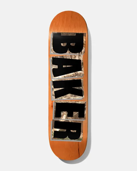 Baker Hawk Brand Logo Big Buck 8.5 skateboard deck: The Baker logo in large black capitals over a grey-edged camouflage-style photo of branches and woodland, on an orange wood-stained deck.