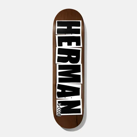 Baker Herman Logo Brown 8.25 skateboard deck: Rider surname HERMAN in huge black capitals, each letter on its own white cut-out block, running the length of a brown stained deck. Small G-Code label at the bottom.
