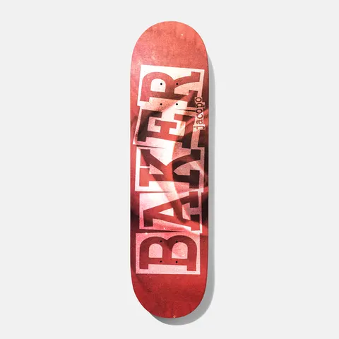 Baker Jacopo Ribbon Time Flies 8.38 skateboard deck: Red-toned deck with large white blocky BAKER lettering in the ribbon style, doubled and offset, over a blurred red photographic texture. Small jacopo text runs up the right side.