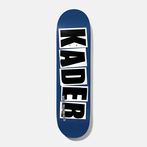 Baker Kader Logo Navy B2 8.25 skateboard deck: Name 'KADER' in large black block letters on tilted white cut-out tiles, with 'Baker Skateboards' in small white text on the bottom tile. Plain navy blue deck.