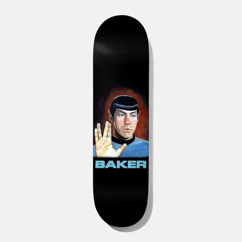 Baker Reynolds Vulcandrew 8.25 skateboard deck: Black deck with a painted portrait of a pointy-eared, bowl-cut figure in a blue sci-fi uniform raising a hand in a split-fingered Vulcan salute against a red glow. Brand name in pale blue capitals below.