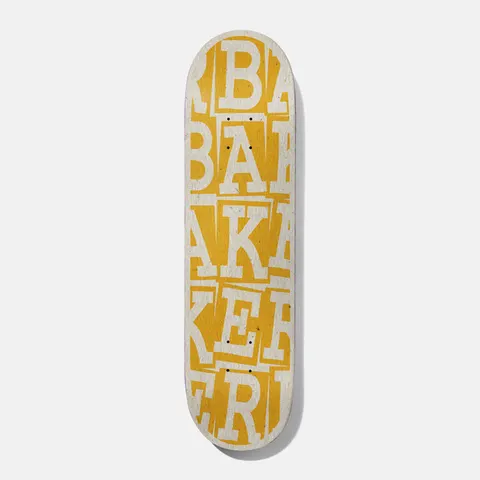Baker Riley Ribbon Stack 8.25 B2 skateboard deck: Brand name repeated in stacked, overlapping cut-out serif letters in cream across the whole deck, over an amber yellow background.