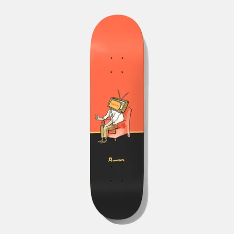 Baker Rowan Brainstorm 8.25 skateboard deck: Deck split between coral orange above and black below. A seated figure with an old television set for a head sits in a red armchair, gesturing, with Rowan signed in yellow at the tail.