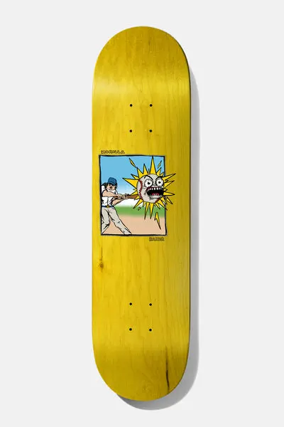 Baker Rowan Creamer 8.125 skateboard deck: A small framed cartoon scene of a baseball batter swinging at an angry screaming baseball with a yellow starburst, set on a natural yellow-stained wood deck.