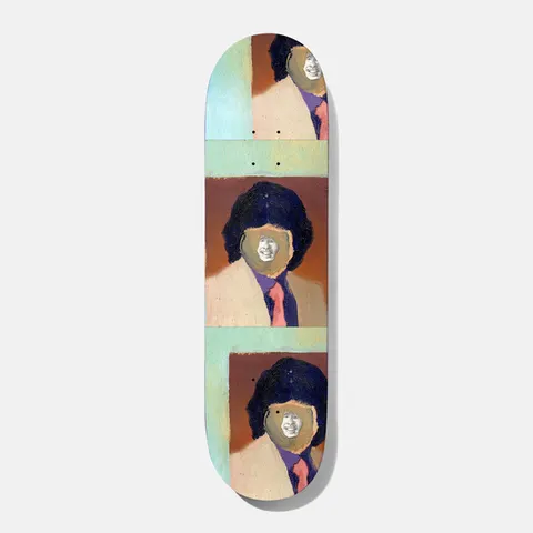 Baker Rowan Mario 8.5 skateboard deck: Painted portrait of a person in a cream jacket, purple shirt and pink tie with a big dark hairstyle, repeated three times in blocks of brown and pale green. A small smiling photo face is pasted over each face.