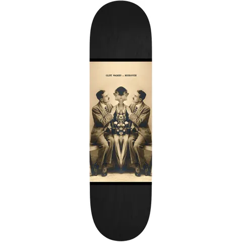 Birdhouse Clint Walker Beautiful Mutants 8.25 skateboard deck: A sepia vintage photograph panel in the centre of a black deck shows two seated men in suits flanking a woman, mirrored and merged so her head is replaced with a symmetrical floral form. A small caption names the rider and brand.