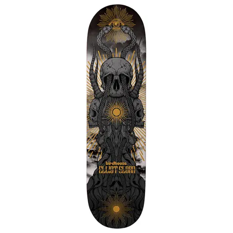 Birdhouse Elliot Sloan Provan 8.38 skateboard deck: A stack of grey horned skulls entwined with snakes and roots, topped by a winged eye and golden sunbursts, against a cloudy sky on a dark deck. Rider name in gold lettering near the tail.