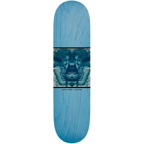 Birdhouse Lizzie Armanto Beautiful Mutants 8.25 skateboard deck: Blue-toned vintage photograph in a black-bordered panel on a light blue wood-stained deck: a mirrored pair of girls in old-fashioned dress holding a dark cat. Small caption beneath.