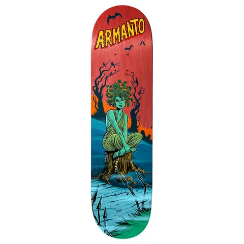 Birdhouse Lizzie Armanto Graveyard 8.25 skateboard deck: A green-skinned Medusa-like woman with snakes for hair sits cross-legged on a tree stump, with bare trees, crows, bats and arrows around her under a red sky and blue ground. Yellow 'Armanto' lettering is at the nose.
