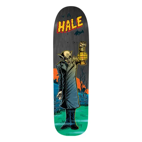 Birdhouse Shawn Hale Graveyard 8.75 skateboard deck: Nosferatu-style vampire in a long coat holds up a lantern in a graveyard with bare trees, bats and an orange moon. Yellow comic-style HALE lettering sits at the top of a grey-black shaped deck.