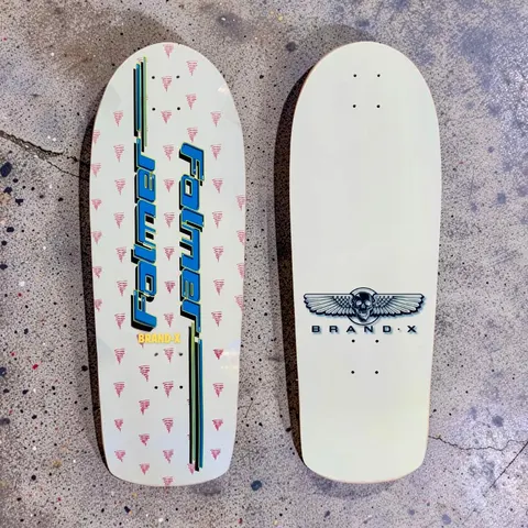Brand-X Mike Folmer Tornados skateboard deck: Cream old-school shaped deck with a pattern of small pink striped tornado shapes and two vertical blue and yellow Folmer logos in a retro italic style. The other deck shows a winged skull above BRAND-X.