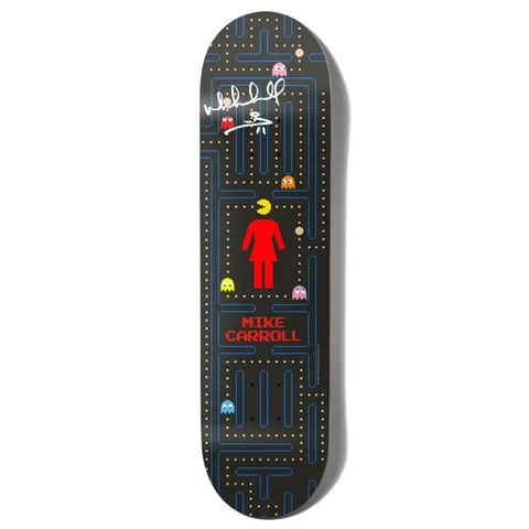 Girl Carroll Pac - Man Signed skateboard deck: Pac-Man maze in blue lines and yellow dots on black, with the red Girl logo figure in the centre, a Pac-Man chasing it and four coloured ghosts. White signature near the nose and rider name in red pixel lettering.