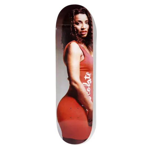 Chocolate Aikens Carls Mom skateboard deck: Full-deck colour photograph of a woman with long curly dark hair in a tight red dress with 'Chocolate' written in white script down the side, posed side-on against a grey backdrop.