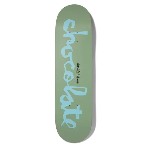 Chocolate Aikens Original Chunk Pop Secret skateboard deck: A large pale blue Chocolate chunk wordmark in blocky hand-cut lettering running down a sage green deck, with a small black Carlisle Aikens signature beside it.
