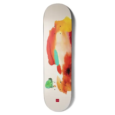 Chocolate Alvarez Dream Beach skateboard deck: A loose watercolour wash in orange, red, yellow and teal on a cream deck, with a small green crouching figure with a cup at the lower left. A small red Chocolate logo sits at the tail.