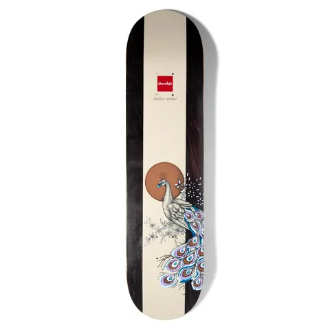 Chocolate Alvarez Peacock Pop Secret skateboard deck: Cream central panel between dark wood-stained sides, showing a detailed line-drawn peacock with blue and purple tail feathers in front of a copper sun, with blossom sprigs. Red Chocolate square logo and signature near the top.