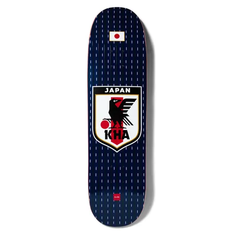 Chocolate Anderson Japan Sakkaa Skidul skateboard deck: Japan national football shirt parody: navy pinstripe background with a rising-sun flag at the top and a shield badge showing a black crow over a red sun, reading JAPAN with KHA beneath.