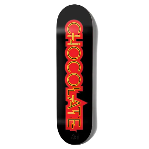 Chocolate Fernandez Parliament skateboard deck: The brand name is stacked vertically in large red capitals with a yellow inline, in a retro, neon-sign style, on a black deck. A small signature-style mark sits near the tail.