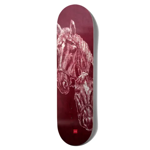Chocolate Herrera San Choco skateboard deck: A textured, drawn or woven-looking portrait of two horses with halters, one in front of the other, in pale pink tones on a deep maroon deck. A small red Chocolate logo sits near the tail.