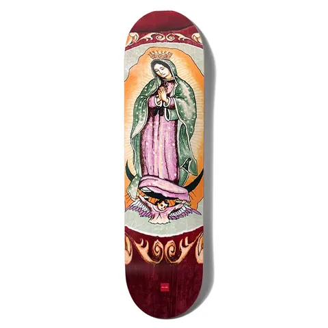 Chocolate Perez San Choco skateboard deck: Our Lady of Guadalupe style devotional image: a crowned praying figure in a green mantle and pink robe on an orange glow, supported by a cherub, framed by flame-like scrolls on a deep red ground.