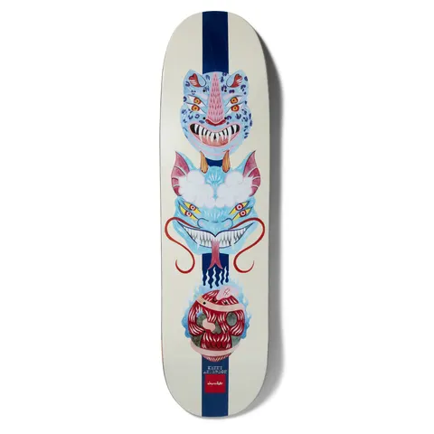 Chocolate Anderson Dog Perfume Mask skateboard deck: Three stacked painted mask-like faces, a blue leopard-spotted tiger, a blue horned dragon on clouds and a red masked head, on a cream deck with a navy central stripe. Name and Chocolate logo at the bottom.