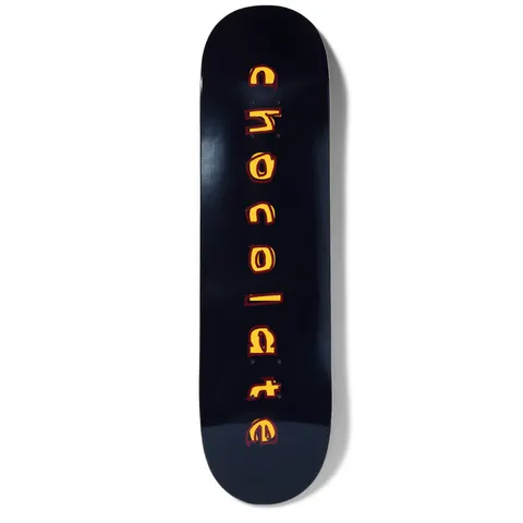 Chocolate Capps Comic skateboard deck: Glossy black deck with the word 'chocolate' stacked vertically down the centre in rough, hand-drawn lettering, filled yellow-orange with a dark red offset outline.