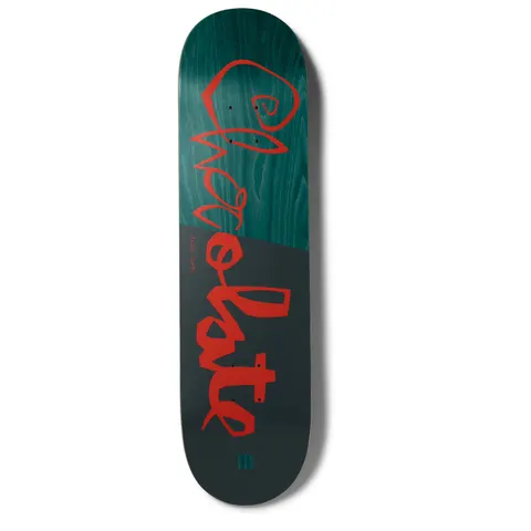 Chocolate Capps Scrunk skateboard deck: Large red hand-drawn Chocolate script logo running down the deck, over a deck split diagonally between teal-stained wood and dark grey. Small rider name and Chocolate chunk logo at the tail.