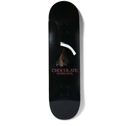 Chocolate Perez Kiss skateboard deck: Black deck with a chocolate kiss drawing, a white paper tag across its tip, and the Chocolate skateboards logo in dusty pink beneath.