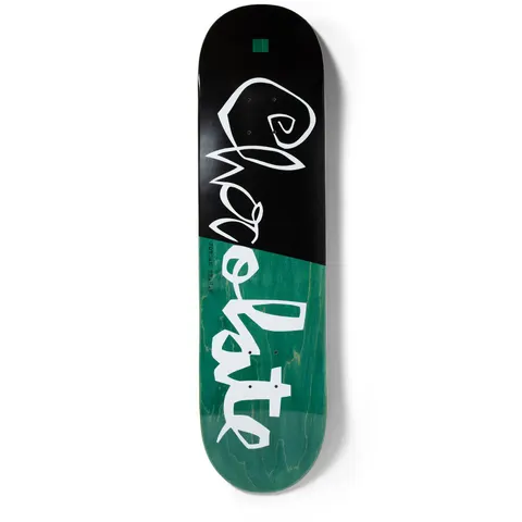 Chocolate Trahan Scrunk skateboard deck: Loose hand-drawn white Chocolate lettering running down the deck, which is split diagonally between a black top half and a teal wood-stained lower half, with a small green square near the nose.