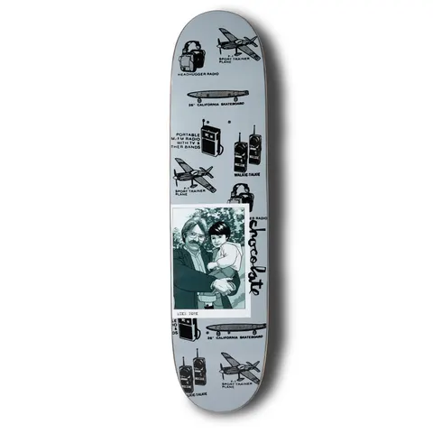 Chocolate York Kid Portrait skateboard deck: Grey deck covered in black line illustrations of headphone radios, walkie-talkies, aeroplanes and a 26-inch California skateboard, with a captioned photo of a man holding a child and a vertical Chocolate logo.