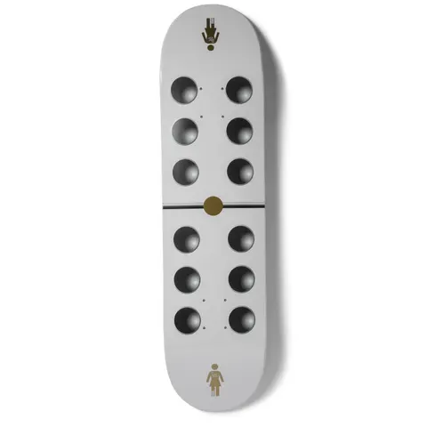 Girl Gass Goodlife skateboard deck: Pale grey deck styled as a domino, with six dark recessed-looking circles on each half divided by a thin black line and a gold centre dot. A small gold Girl logo sits at the tail and a gold figure icon at the nose.