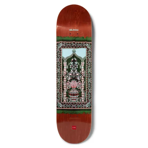 Chocolate Herrera Prayer Rug skateboard deck: Ornate prayer-rug design with a patterned border, arched window and flowering vase, in dark green, pale blue and pink with fringed edges, on a red-brown stained deck.