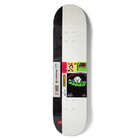 Chocolate Alvarez Mixtape skateboard deck: A cassette or album-sleeve style design with a stack of small labels: a smiling man's photo, a record-label logo, a cartoon figure on a green dollar-sign scribble and a barcode, on a white deck with a black side strip.