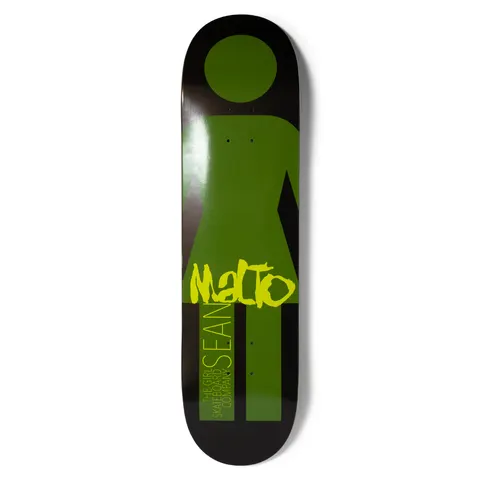 Girl Malto Giant Metal OG skateboard deck: Giant Girl logo figure in olive green on a black deck, with Malto in rough yellow-green brush lettering across the skirt. Vertical text 'The Girl Skateboard Company Sean' runs down one leg.