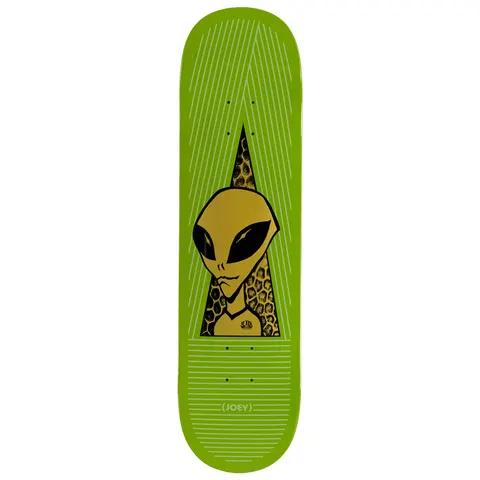 Alien Workshop Guevara Visitor Gold skateboard deck: Gold alien head with black eyes inside a dark triangular spike filled with a honeycomb texture, on a lime green deck with fine white line patterns. A small (JOEY) tag sits near the tail.