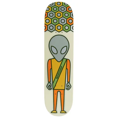 Alien Workshop Soldier Regalia skateboard deck: Cartoon grey alien standing front-on in an orange and mustard outfit with a green sash reading WORKSHOP, on a cream ground. A pattern of hexagonal nuts in green, orange, yellow and grey fills the nose.
