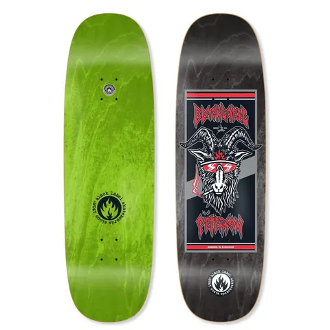 Black Label Nick Peterson Burnside Brew Tugboat skateboard deck: Beer-label panel with a goat head in red sunglasses smoking a cigarette, framed in red and grey stripes with metal-style lettering. Black Label flame logo below, on a black stain; green bottom shown beside.
