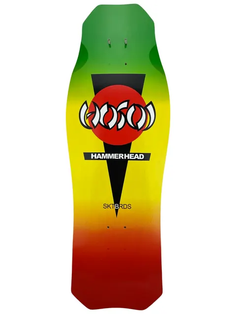 Hosoi O.G. Hammerhead Rasta skateboard deck: Rasta-faded green, yellow and red deck in the Hammerhead shape, with a black downward triangle, a red circle, and the white Hosoi claw logo. A black HAMMERHEAD bar and SKTBRDS text sit below.