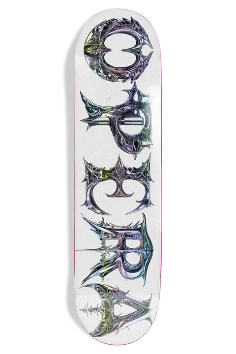 Opera Neo EX7 (White) skateboard deck: Spiky gothic Opera lettering rendered in shiny iridescent chrome, running vertically down a white deck.