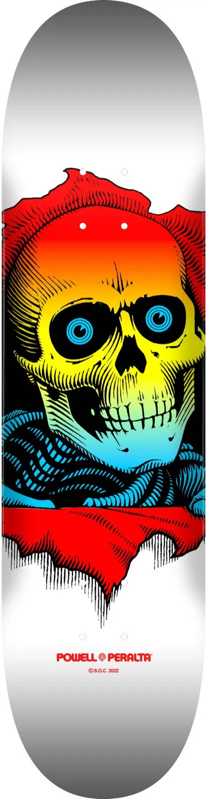 Powell Peralta Ripper Yellow Fade White skateboard deck: A large skull with blue eyes bursts through a torn hole, with skeletal ribs below. The skull is filled with a fade from red through yellow to blue, with black linework, on a white deck.