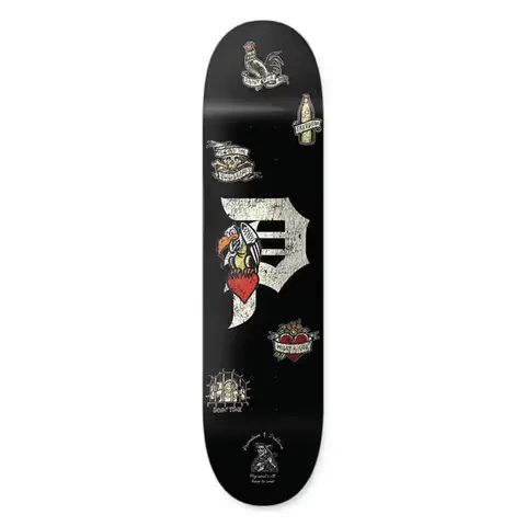 Primitive x Sublime Freedom skateboard deck: A black deck with the Primitive 'P' logo in distressed cream, surrounded by small tattoo-flash-style images including a rooster, an eagle on a heart, a bottle, a skull and a barred cell, plus a reaper at the base.