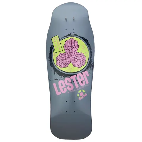 Tracker Lester Kasai Oak Leaf Modern Concave skateboard deck: Old-school shaped grey deck with a lime-green circle holding a pink three-lobed oak leaf crest, ringed by a black brush-stroke border. A small vertical panel of Japanese script sits upper left, with large pink 'Lester' lettering below.